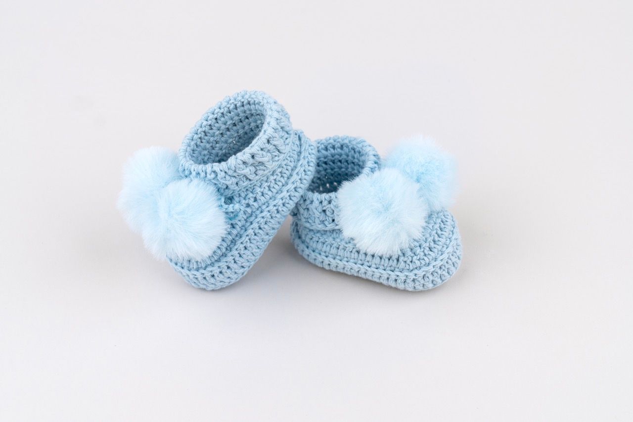 Topsy faux fur pom pom bootes